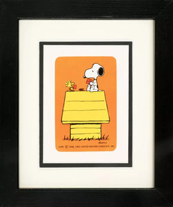 Cadre Snoopy jouant aux cartes